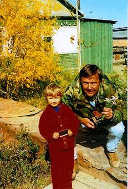1991, Kamchatka, Russia.  Picture for son of village chief and flowers for the 